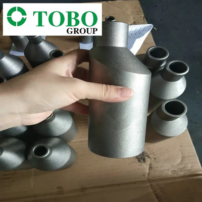 Il Ti di titanio Gr7 2" degli accessori per tubi dell'acciaio legato ASTM B363 x 1" lega di titanio di SCH10S x SCH40S foggia il capezzolo con uno stampo