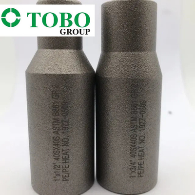 L'acciaio legato di titanio forgiato degli accessori per tubi ASTM B861 GR2 2" x 1" lega di titanio di SCH10S x SCH40S foggia il capezzolo con uno stampo